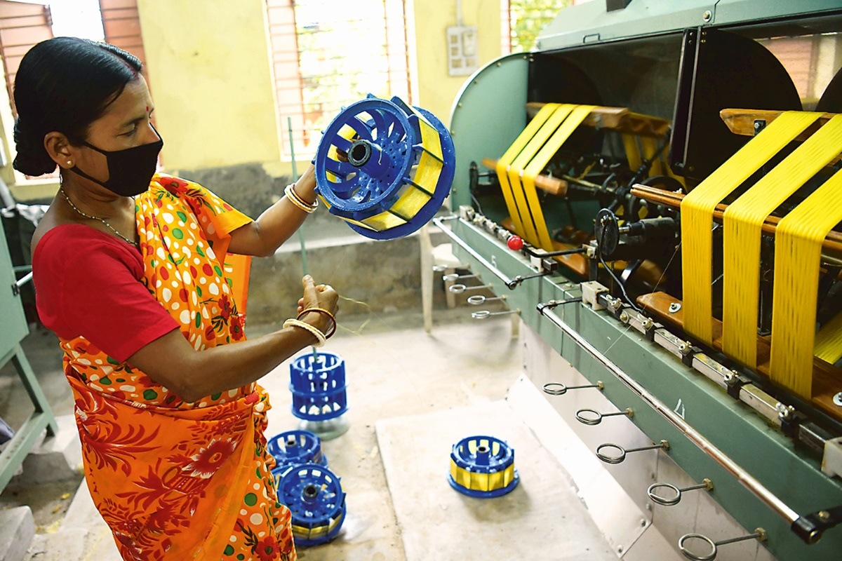 A worker at a silk factory in Agartala (Express photo)