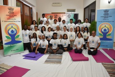 “Yog Guru Phillippe Torella, a Yoga instructor at the 'Art of Living', Abidjan led the Yoga session for all the participants which encompassed Yoga asanas. Image: Indian Missions in Abidjan
