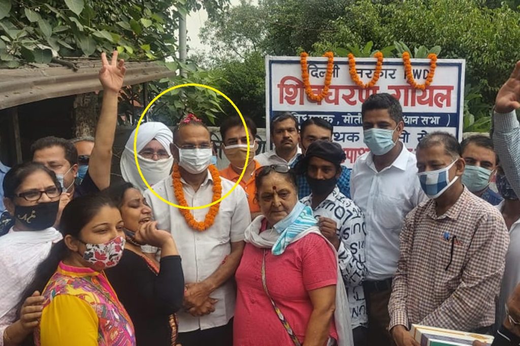 AAP MLA Shiv Charan Goel during the inauguration of the Speed Breaker.