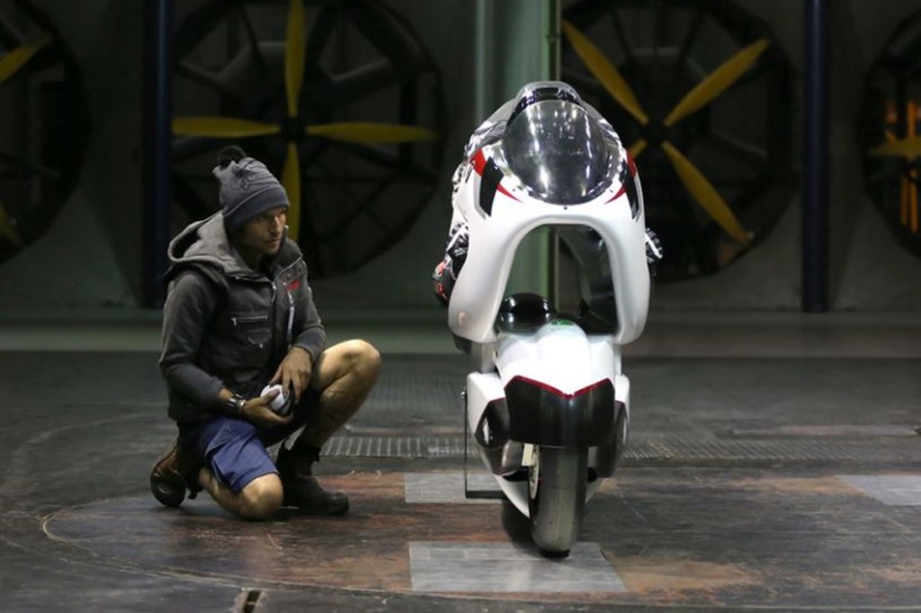 Guy Martin inspects the White Motorcycle Concepts WMC250EV