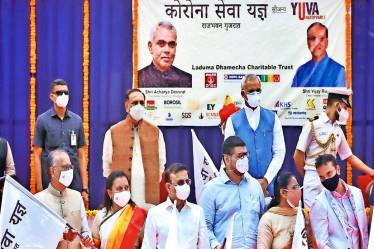 The beneficiaries of the initiative include health workers, Covid-19 vaccination staff, ASHA workers, lab technicians and attendants among others. (Credit: The Indian Express)