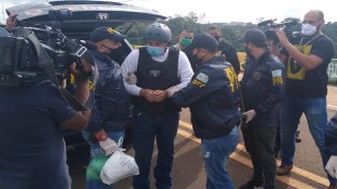 Major Winner Angel Cabrera being taken into custody after being extradited from Brazil last month.