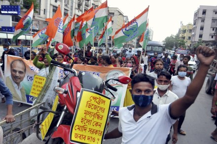 Congress activists in a protest rally against the hike in LPG and fuel prices in Kolkata (PTI Image)