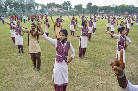 School girls practice for the 75th Independence Day function in Patiala (PTI Image) School girls practice for the 75th Independence Day function in Patiala (PTI Image)