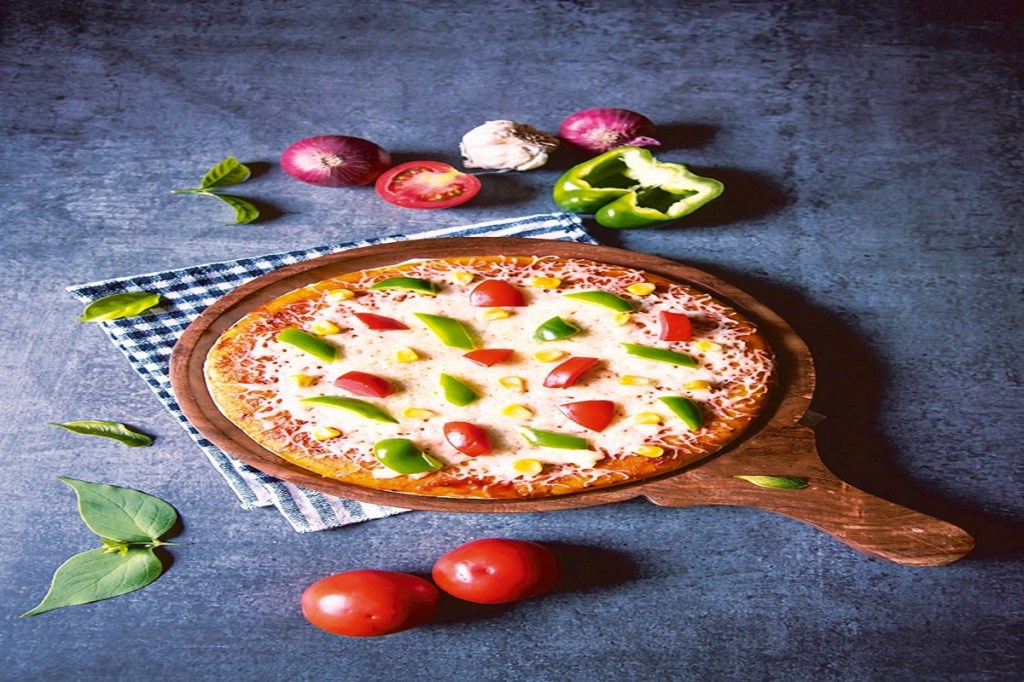 The Love Triangle Pizza guys have a USP which is truly unique: the pizzas are cooked in their delivery vans (they have two at the moment) while it drives to your place.