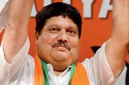 Three crude bombs were thrown at BJP MP Arjun Singh's residence in West Bengal's North 24 Parganas district on Tuesday night.