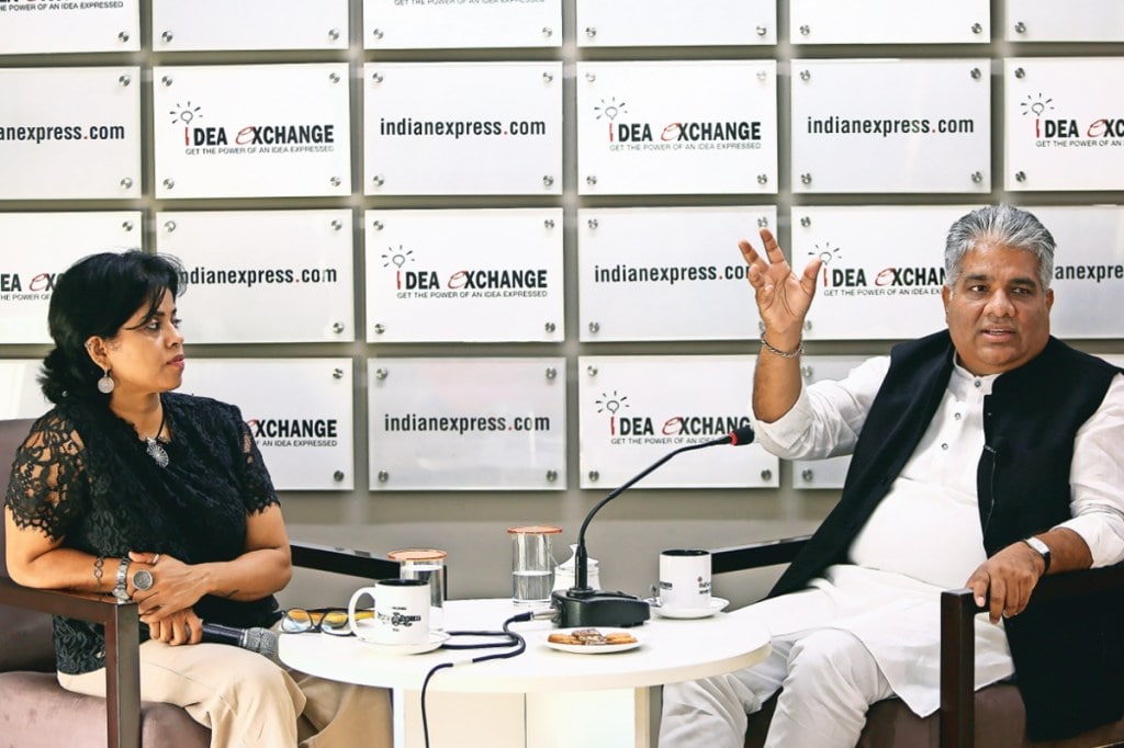 Union minister Bhupender Yadav with Liz Mathew in The Indian Express newsroom (Image: Gajendra Yadav)
