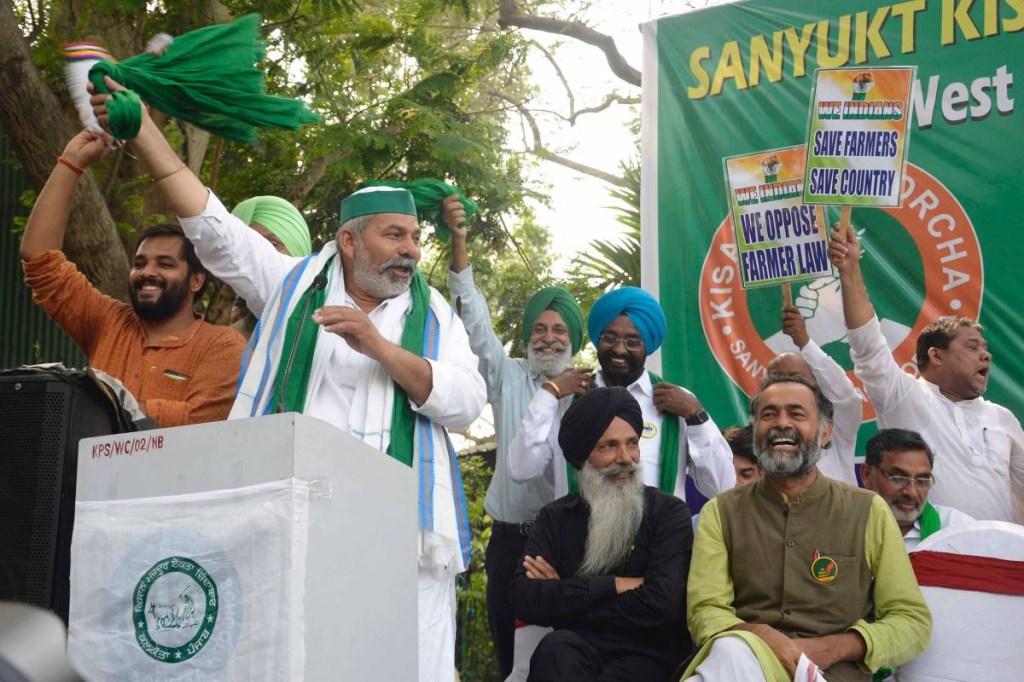 BKU spokesperson Rakesh Tikait and Yogendra Yadav of Samyukt Kisan Morcha during Mahapanchayat in front of Gandhi statue in Kolkata on March 12, 2021. (Express Photo) BKU spokesperson Rakesh Tikait and Yogendra Yadav of Samyukt Kisan Morcha during Mahapanchayat in front of Gandhi statue in Kolkata on March 12, 2021. (Express Photo)