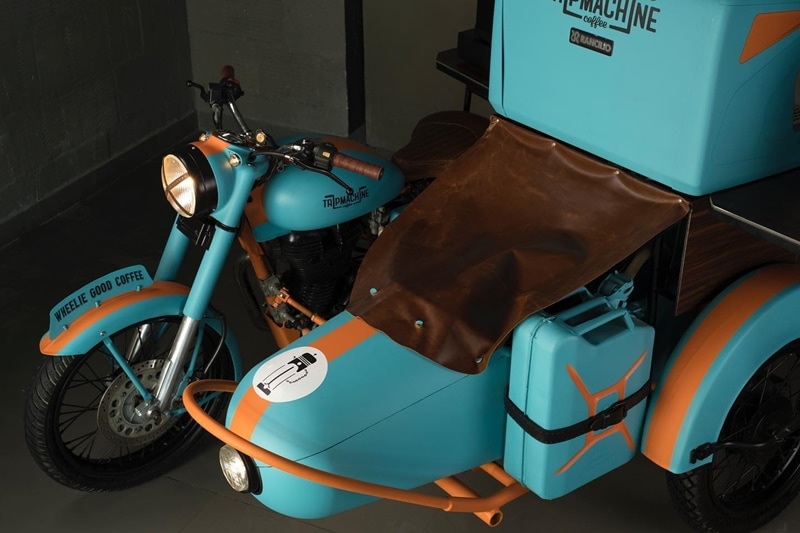 Since the company specializes in leather, there’s a lot of that too. The grips, ‘X’ on the headlight, sidecar cover and traditional sprung saddle are all custom pieces. Wood trim on the counters adds another classy touch.