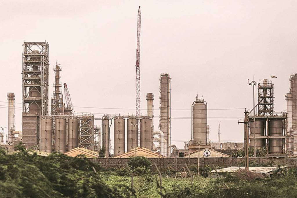 The Reliance Industries Ltd. oil refinery in Jamnagar, Gujarat, India, on Saturday, July 31, 2021. The Indian city of Jamnagar is a money-making machine for Asia's richest man, Mukesh Ambani, processing crude oil into fuel, plastics and chemicals at the world's biggest oil refining complex that can produce 1.4 million barrels of petroleum a day. Photographer: Dhiraj Singh/Bloomberg