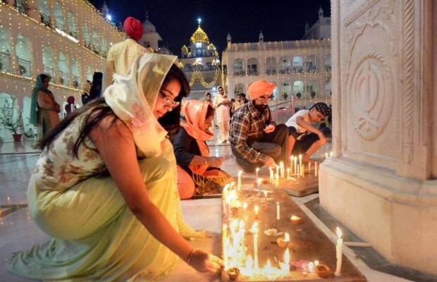 Devotees light candles at Guru Gobind Singh Gurudwara in Patna on the occasion of Deepawali (PTI Image)