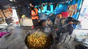A farmer prepares 'langar' at Singhu border to mark the one-year anniversary of farmers' agitation, in New Delhi (PTI Image)