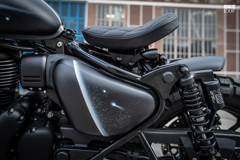 After adding new bars, YSS piggyback shocks and chunky Continental TKC tires, Arjan’s work was done. He handed over the bike to Royal Kustom Works, who finished it off with lashings of black paint and Star Wars-themed striping, complete with pinpricked star constellations. (Source: Bikeexif)