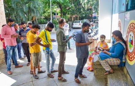 Beneficiaries wait to receive a dose of Covid-19 vaccine at a government hospital amid fear of spread of Omicron variant in Bengaluru (PTI Image)