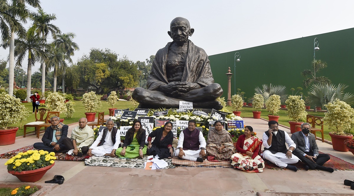 Suspended Rajya Sabha members during their dharna at Parliament complex in New Delhi (PTI Image)