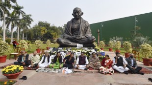 Suspended Rajya Sabha members during their dharna at Parliament complex in New Delhi (PTI Image)