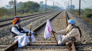 Farmers under the leadership of Kisan Mazdoor Sangharsh Committee block a railway track of Amritsar-Delhi railway line to protest against the state government for their various demands, including waiver of total debt of farmers and labourers, and compensation for the damage to paddy crops, at Devi Dass Pura village, near Amritsar (PTI Image)
