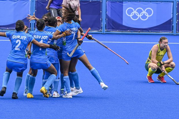 Indian players celebrate their victory against Australia during women's field hockey quarterfinal match at the 2020 Summer Olympics, in Tokyo on August 2, 2021. (PTI Photo)