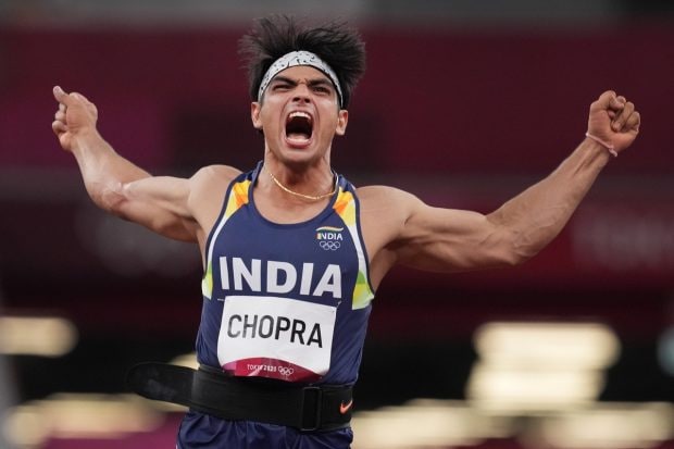 India's Neeraj Chopra reacts as he competes in the final of the men's javelin throw event at the 2020 Summer Olympics, in Tokyo on August 7, 2021. (PTI Photo)
