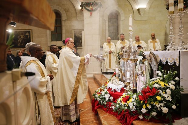 A Christmas midnight Mass at Saint Catherine's Church, in the Church of the Nativity, in Bethlehem was led by the acting Latin Patriarch of Jerusalem Pierbattista Pizzaballa. (Image: AP)