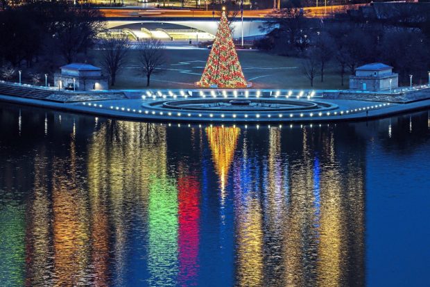 The Christmas tree at Point State Park in downtown Pittsburgh was illuminated at dawn on Christmas Eve. (Image: AP/PTI)