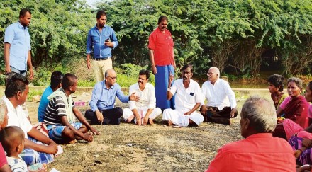 Anil Kumar SG, CEO and founder of Samunnati, with farmers