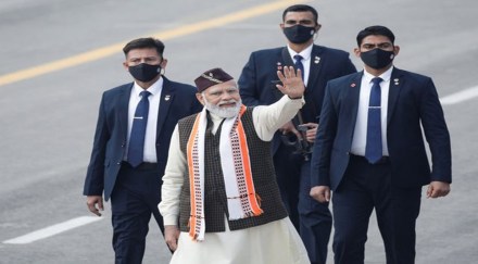 Prime Minister Narendra Modi waves towards the crowd as he leaves after the Republic Day parade in New Delhi (Reuters image)