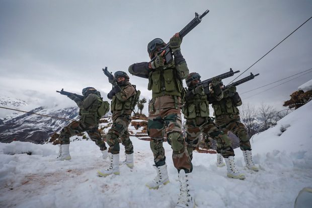 BSF Jawans patrol LoC amid snowfall. They never hesitate to put their lives at stake. (PTI Photo)