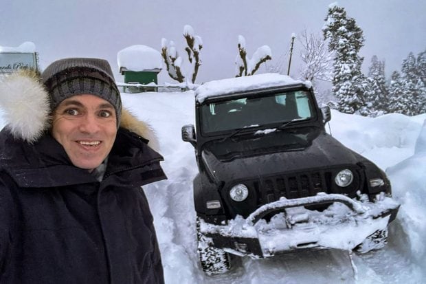 Former Jammu & Kashmir CM Omar Abdullah at a snow covered road in Gulmarg. (PTI Photo)