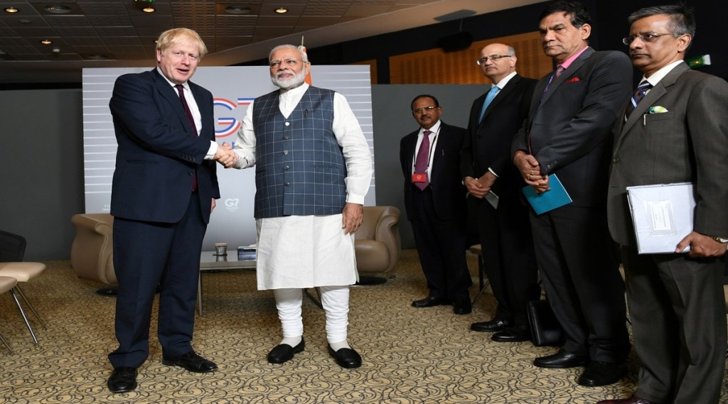India's Prime Minister Narendra Modi with UK PM Boris Johnson. (File Photo: Reuters)