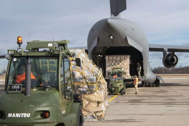 Siauliai: In this photo provided by Lithuanian Ministry of National Defense, Lithuania's servicemen load Stinger anti-aircraft systems, and body armor vests into military cargo plane, as part of the Lithuania's security assistance to Ukraine at the Siauliai airbase, some 230 km (144 miles) east of the capital Vilnius, Lithuania. US State Department had allowed Lithuania, Latvia and Estonia to send US-made weaponry to Ukraine, including Lithuania's anti-tank Stinger missiles. (AP Photo)