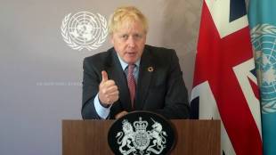 Johnson admitted that while the pandemic is not over, vaccines have made it possible for the country to start moving towards “normality”. (File/AP)