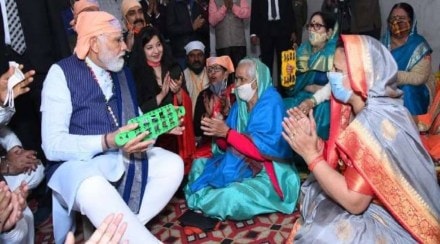 During his visit to the temple, Modi also joined devotees singing bhajans. During his visit to the temple, Modi also joined devotees singing bhajans.