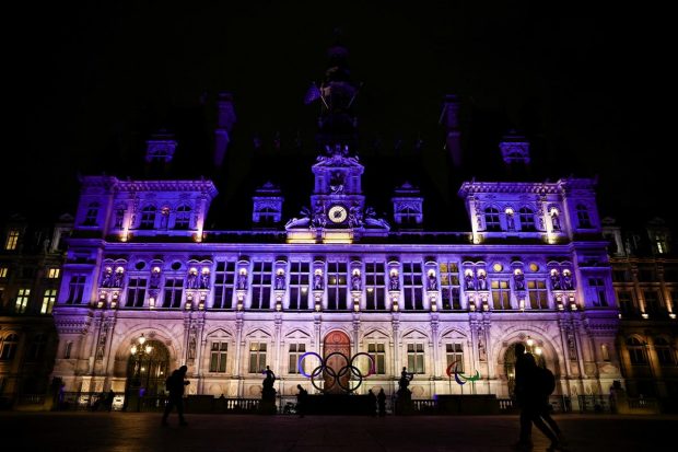 Paris City Hall lights up in the colours of the Ukraine flag, in support of the Ukrainian people, following Russia's decision to recognise separatists and send troops to their aid, in Paris, France. (Reuters Photo)