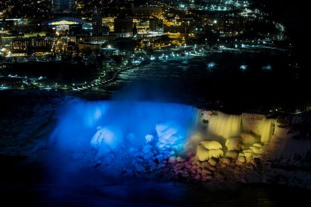 The American Falls and Bridal Veil Falls are lit in the colours of the Ukrainian flag, following the Russian invasion in Ukraine, as seen from Niagara Falls, Ontario, Canada. (Reuters Photo)