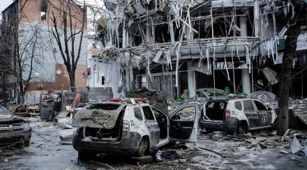 Damaged vehicels sit among debris in Kharkic city centre in Ukraine. (AP News) Damaged vehicels sit among debris in Kharkic city centre in Ukraine. (AP News)