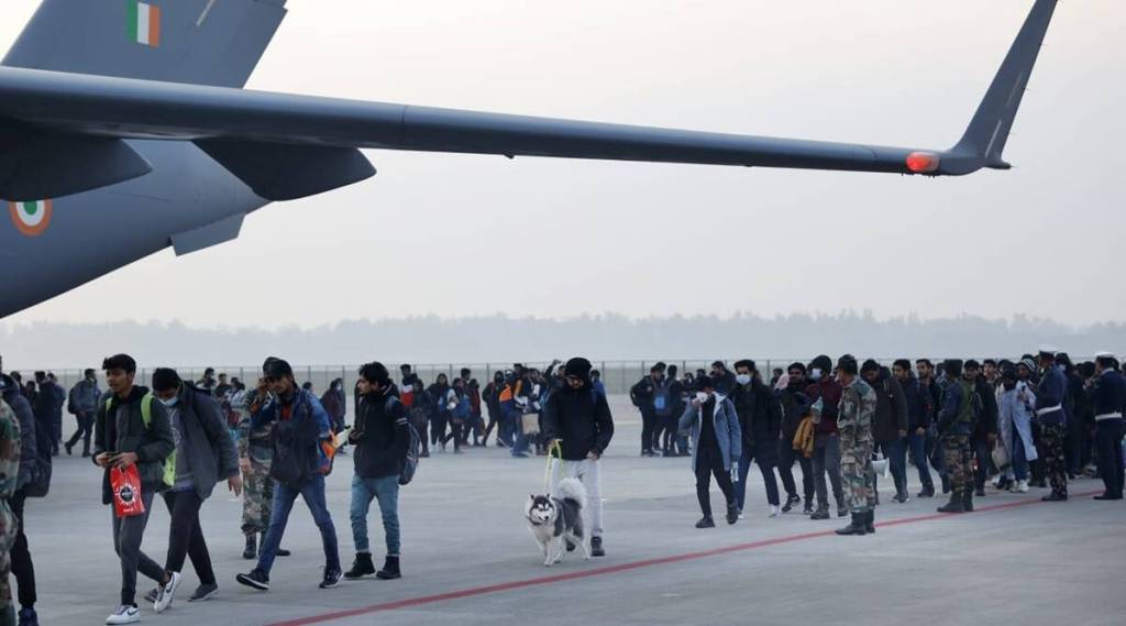 Indians stranded in Ukraine arrive at the Hindon airbase in Ghaziabad, on Thursday. (Express Photo by Praveen Khanna)
