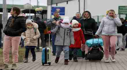 People arrive at the border crossing between Poland and Ukraine, after Russia launched a massive military operation against Ukraine, in Medyka, Poland, February 25, 2022. REUTERS/Kacper Pempel People arrive at the border crossing between Poland and Ukraine, after Russia launched a massive military operation against Ukraine, in Medyka, Poland, February 25, 2022. REUTERS/Kacper Pempel