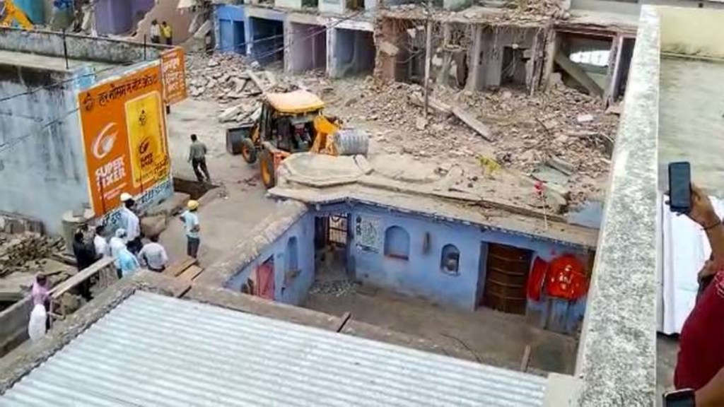 Two temples and some shops were demolished on Sunday and Monday with officials describing the action as part of an anti-encroachment drive to widen a road in the town.