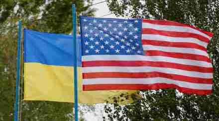 FILE PHOTO: National flags of Ukraine and the U.S. fly at a compound of a police training base outside Kiev, Ukraine, May 6, 2016. REUTERS/Valentyn Ogirenko