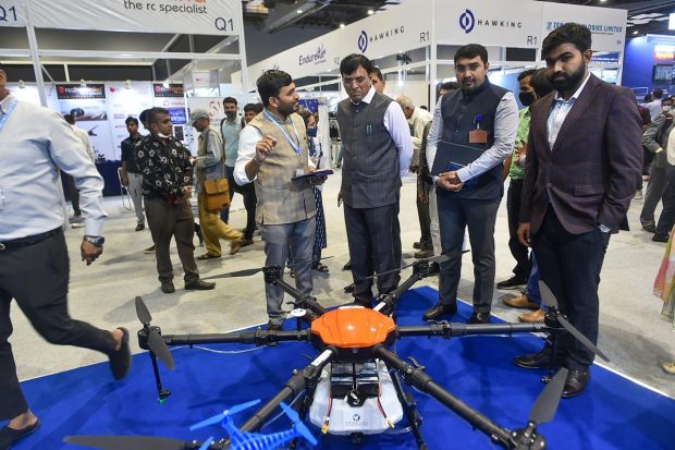 Union Health Minister Mansukh Mandaviya being briefed about a drone on display during the Bharat Drone Mahotsav, India's largest drone festival, at Pragati Maidan in New Delhi. (PTI Photo)