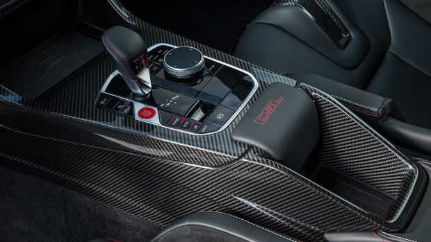 Just like the outside, one can observe CSL badges in the interior. To reinforce the idea of speed, the interior has many red accents and carbon fibre panels. The steering wheel gets the M Alcantara treatment. There are no seats at the back but the area can be used to store two helmets. By removing the bench at the back, BMW managed to shave off 21kg.