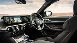 BMW sees full-year drop in output amid volatile second half