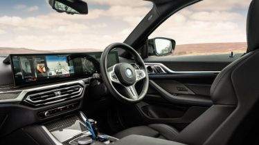 BMW sees full-year drop in output amid volatile second half