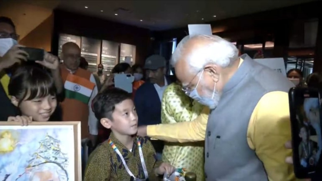 Prime Minister Modi interacted with children outside the hotel in Tokyo. He also saw the drawing of a young girl and signed an autograph for her during his interaction with the children. Prime Minister Modi interacted with children outside the hotel in Tokyo. He also saw the drawing of a young girl and signed an autograph for her during his interaction with the children.