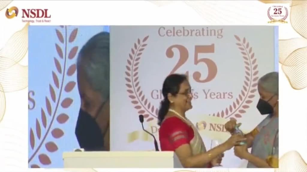 In the video, Chunduru is seen pausing and gesturing for water mid-speech. Soon after, Sitharaman walks across the stage and offers a water bottle to the NSDL Director. 