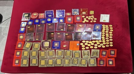 The cash and coins were "unexplained" and were kept in a "secret" place, it said in a statement.