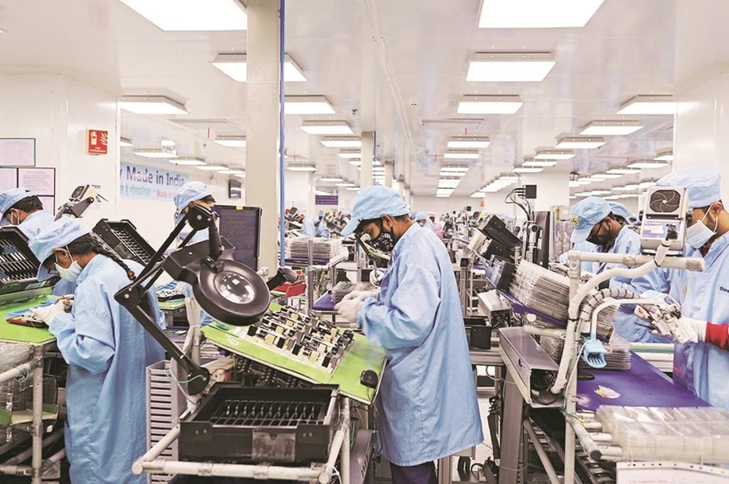 Workers assemble mobile phones at a Dixon Technologies factory in Noida, Uttar Pradesh, India, on Thursday, Jan. 28, 2021. Dixon boasts a market value of more than $2.5 billion and the capacity to produce about 50 million smartphones this year. Photographer: Anindito Mukherjee/Bloomberg Workers assemble mobile phones at a Dixon Technologies factory in Noida, Uttar Pradesh, India, on Thursday, Jan. 28, 2021. Dixon boasts a market value of more than $2.5 billion and the capacity to produce about 50 million smartphones this year. Photographer: Anindito Mukherjee/Bloomberg