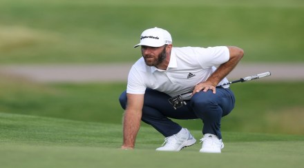 Dustin Johnson of the US lines up a putt. (Reuters)