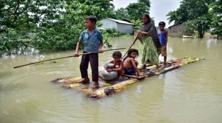 The deluge has hit 93 revenue circles and 3,510 villages, while 2,65,788 people have taken shelter in 717 relief camps. (Reuters)